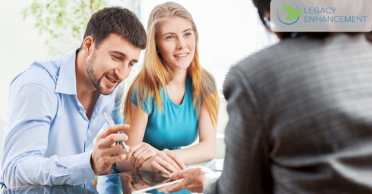 couple discussing a trust with a lawyer